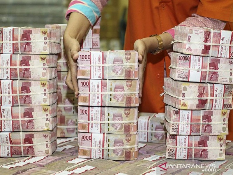 Ilustrasi tumpukan uang.