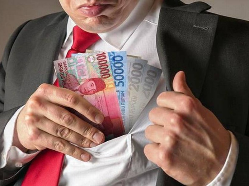 Ilustrasi menilap uang korupsi.